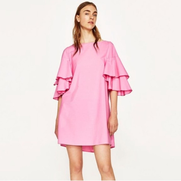 pink ruffle shoulder dress
